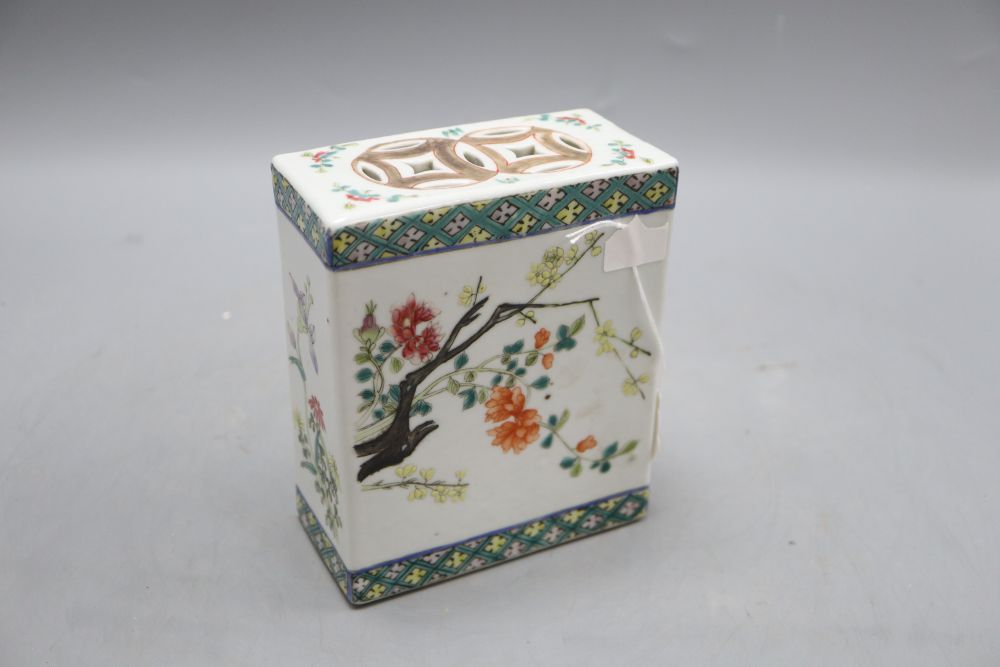 A Chinese famille rose pillow, late 19th century, height 15cm